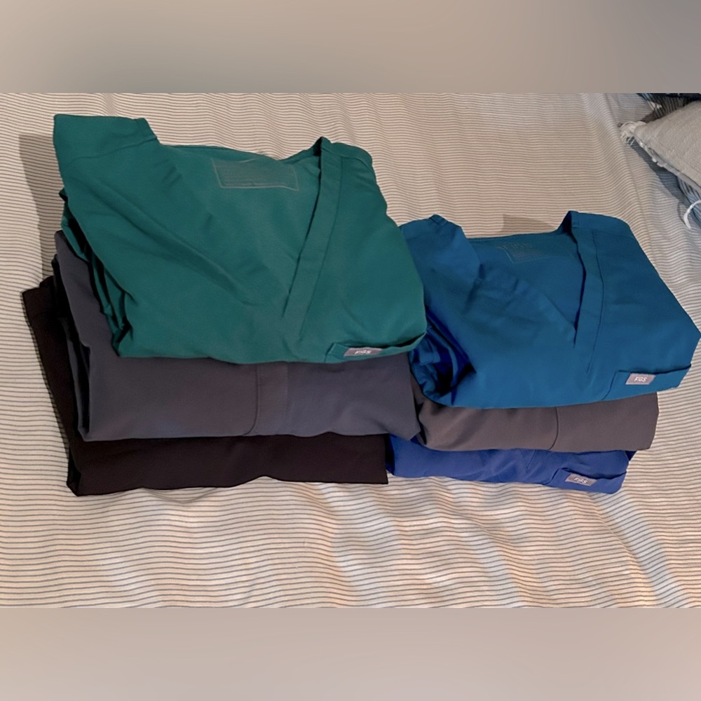 6 sets of FIGS Scrubs (used in good condition) top and bottom size small